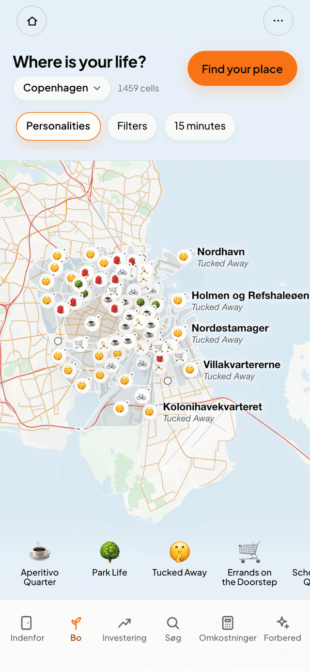 Bagved ses områdekortet med de farvede kvarterer.